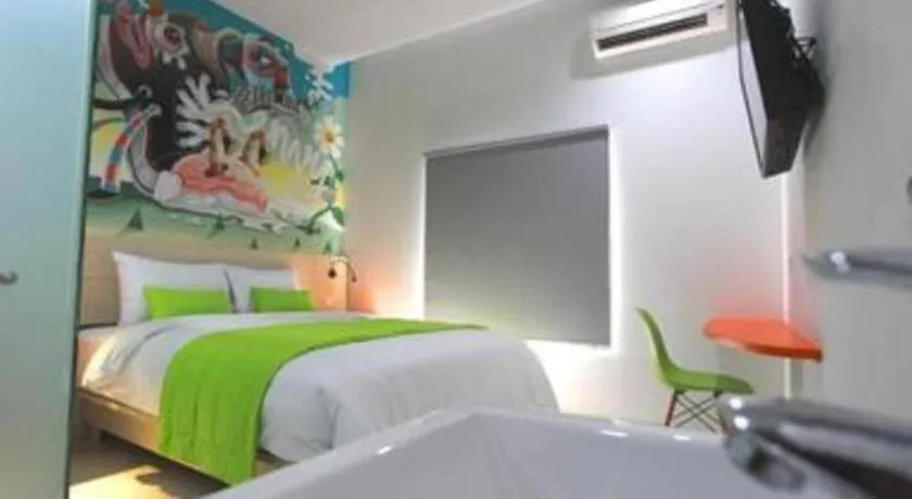 Bed in Fizz Hotel Lombok