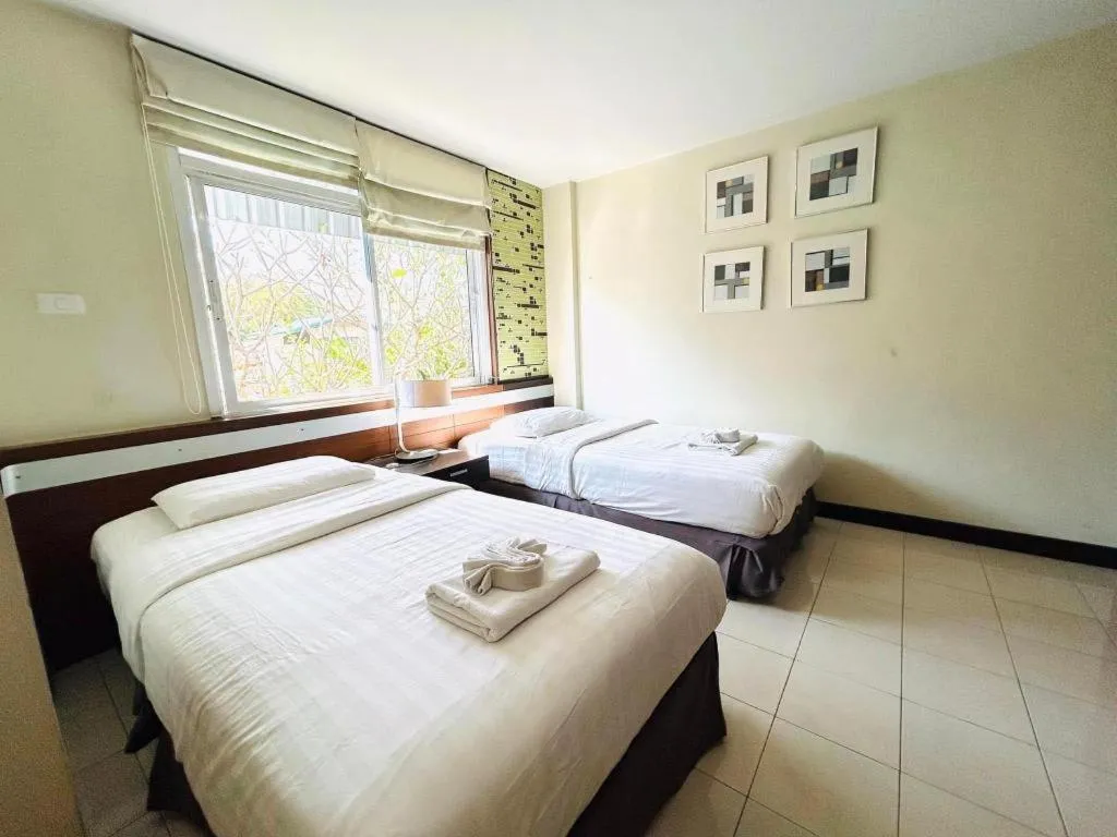 Bed in Huern Che Ta One Hotel