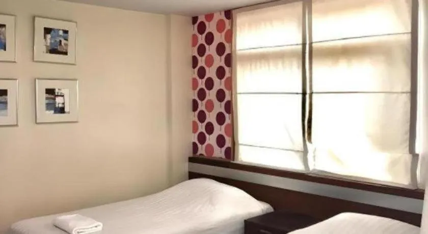 Bed in Huern Che Ta One Hotel