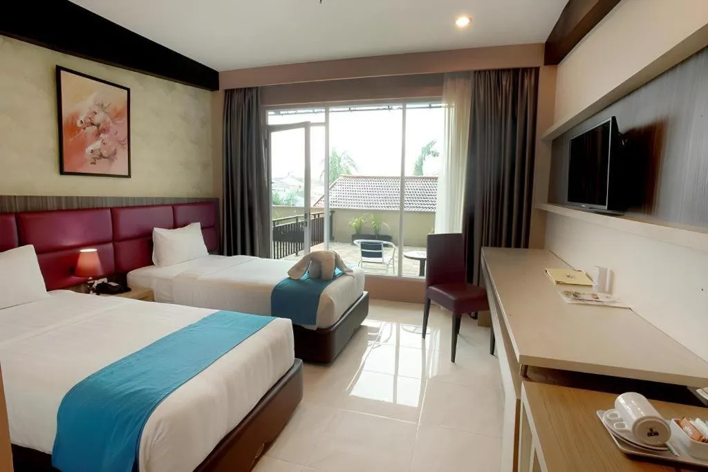 Bed in Asoka Luxury Hotel