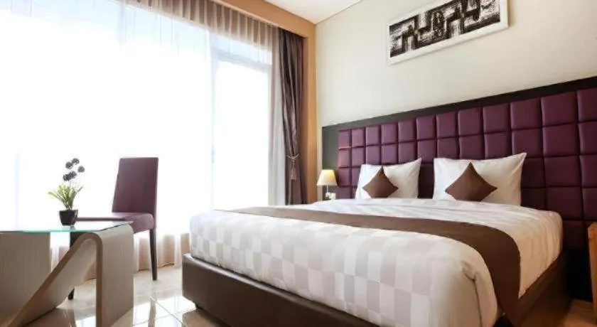 Bed in Asoka Luxury Hotel