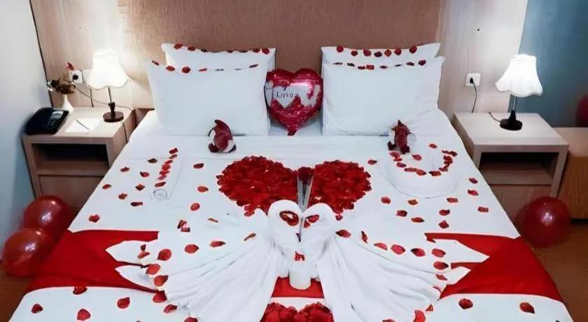 Bed in Asoka Luxury Hotel