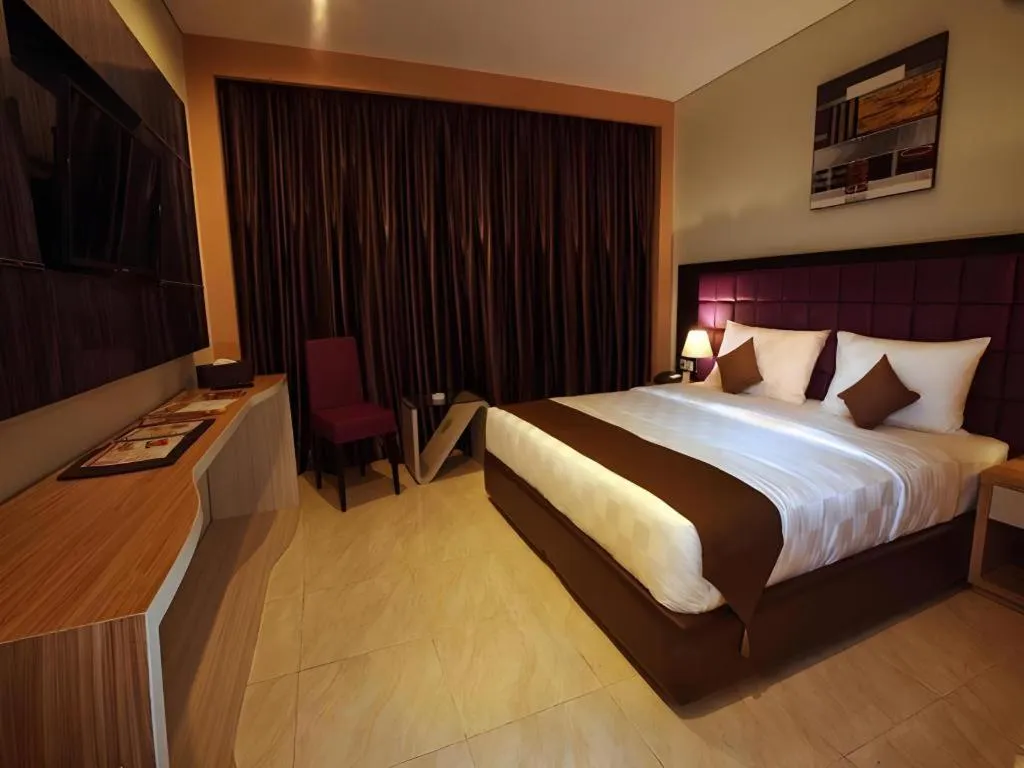 Bed in Asoka Luxury Hotel