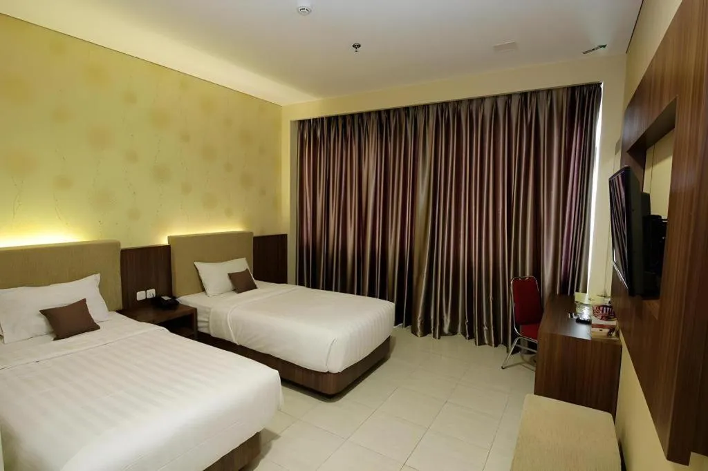Bed in Asoka Luxury Hotel