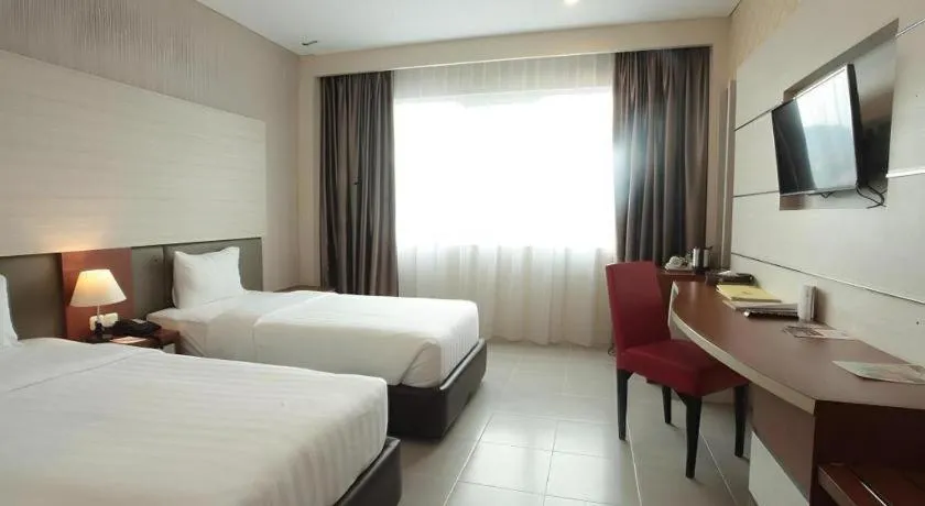 Bed in Asoka Luxury Hotel