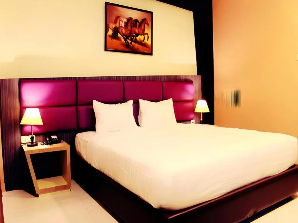 Bed in Asoka Luxury Hotel
