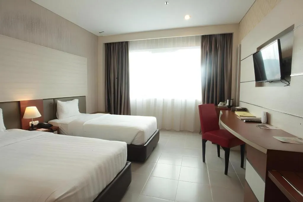 Bed in Asoka Luxury Hotel