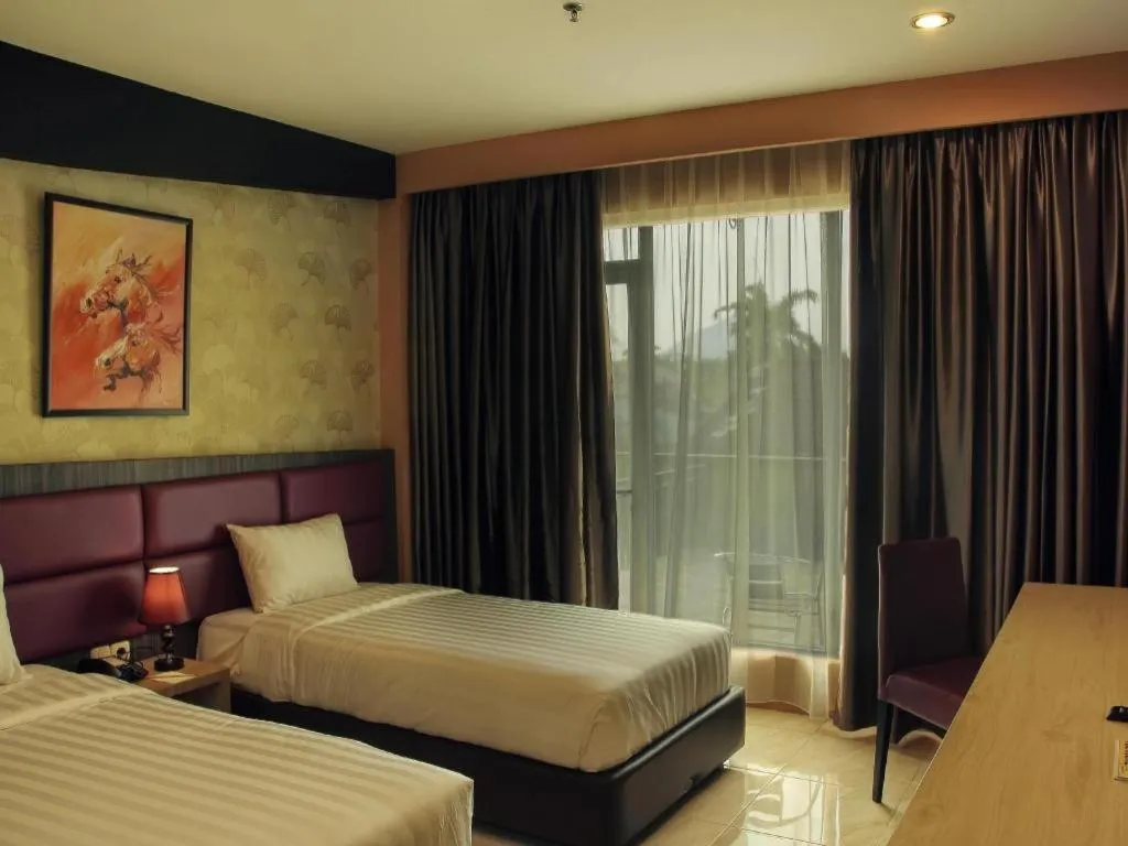 Bed in Asoka Luxury Hotel