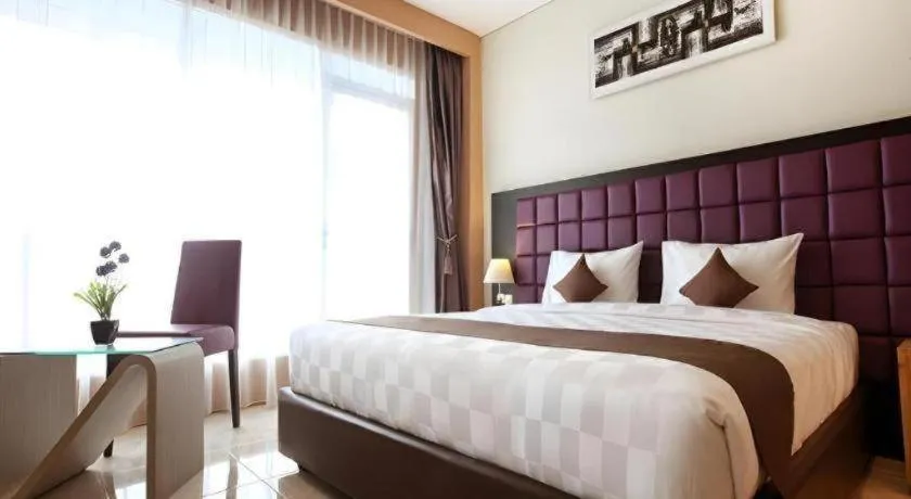 Bed in Asoka Luxury Hotel