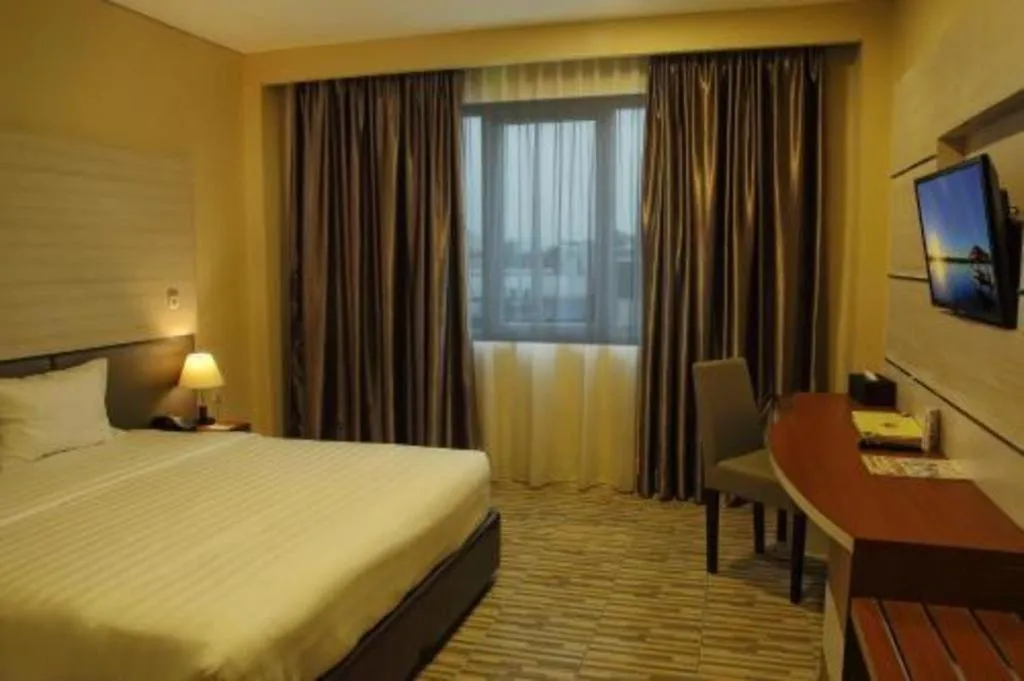 Bed in Asoka Luxury Hotel