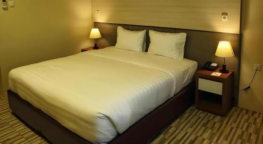 Bed in Asoka Luxury Hotel