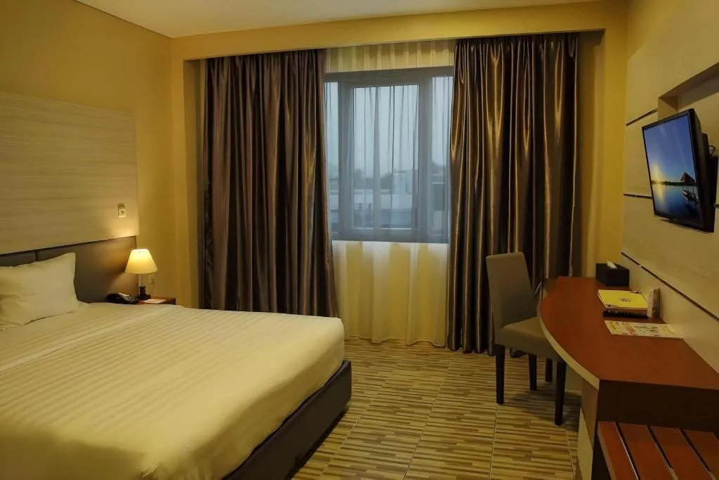 Bed in Asoka Luxury Hotel