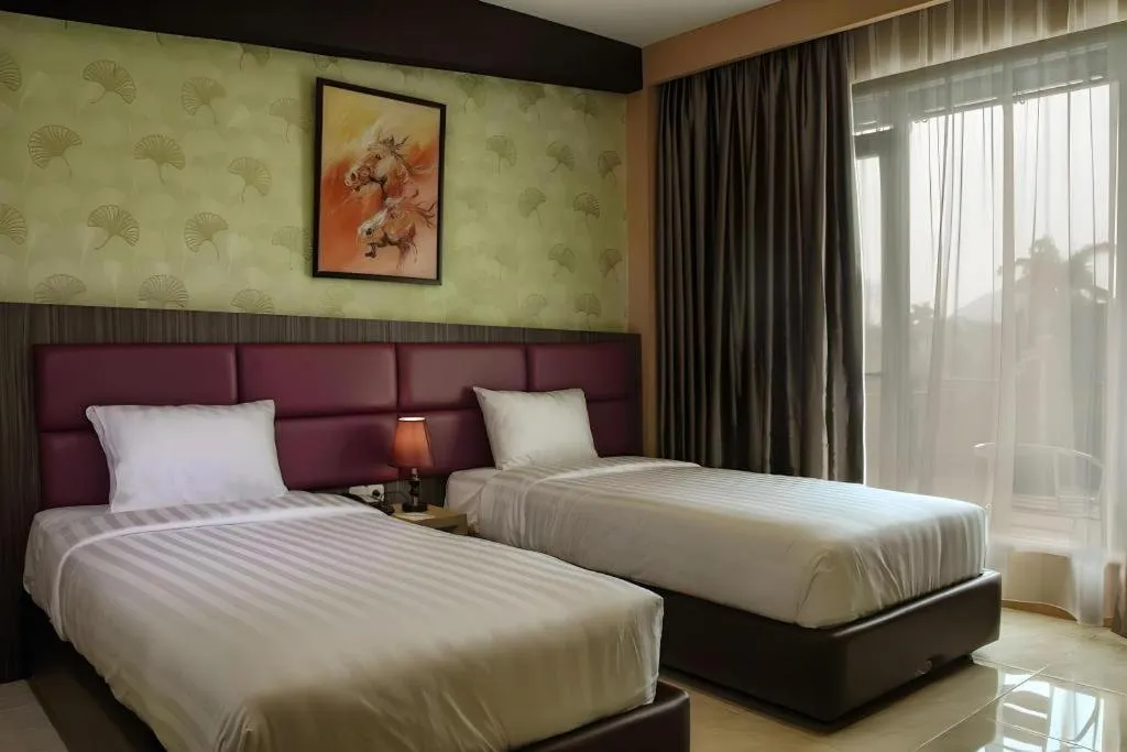 Bed in Asoka Luxury Hotel