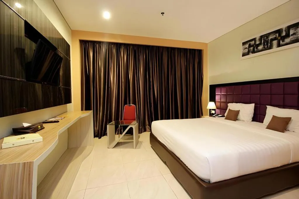 Bed in Asoka Luxury Hotel