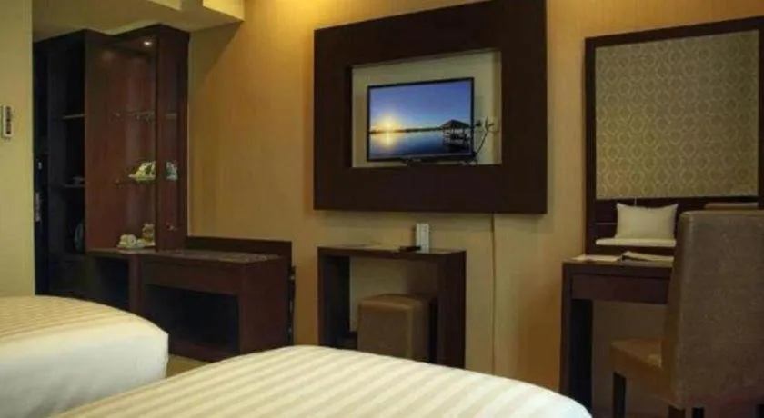 Bed in Asoka Luxury Hotel