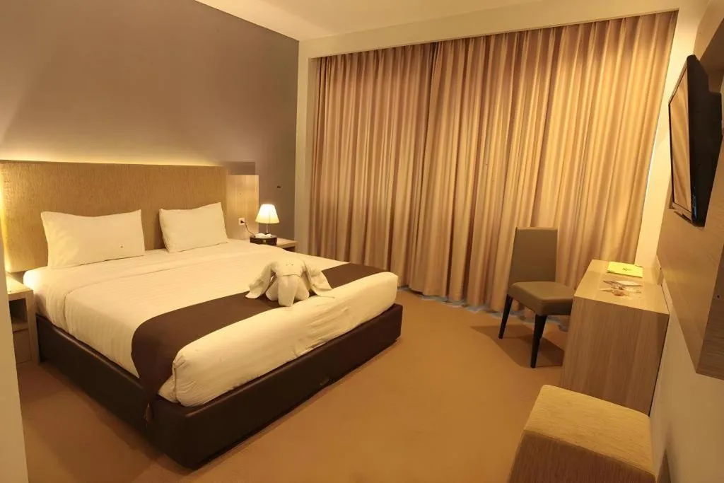 Bed in Asoka Luxury Hotel