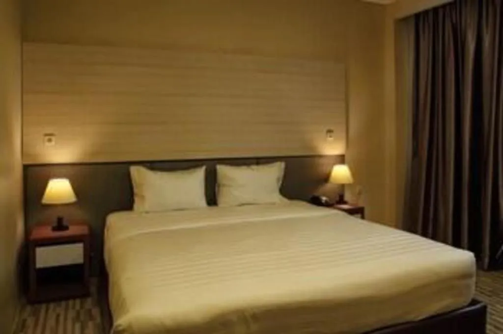 Bed in Asoka Luxury Hotel
