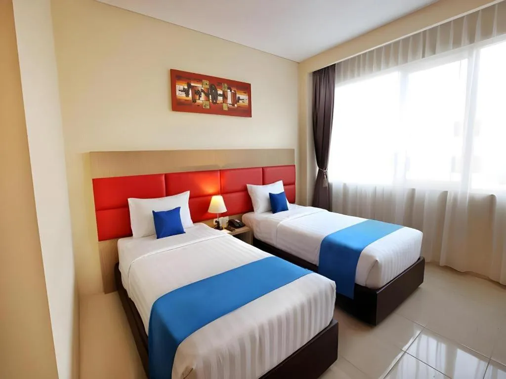 Bed in Asoka Luxury Hotel