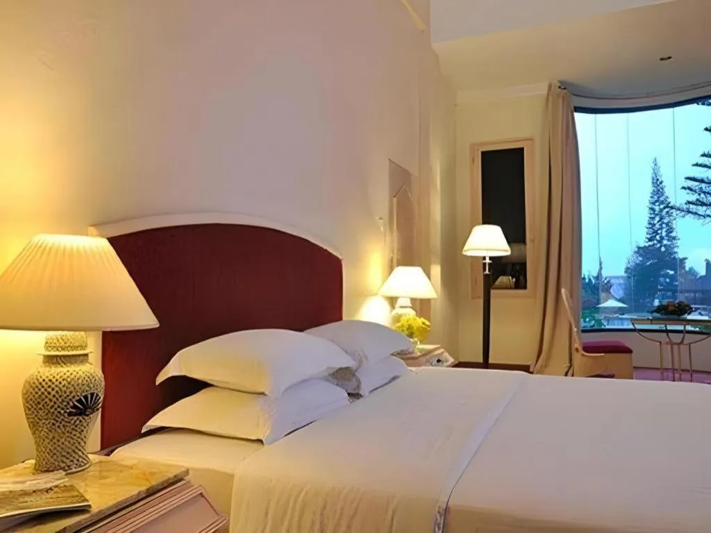 Bed in Grand Mutiara Hotel