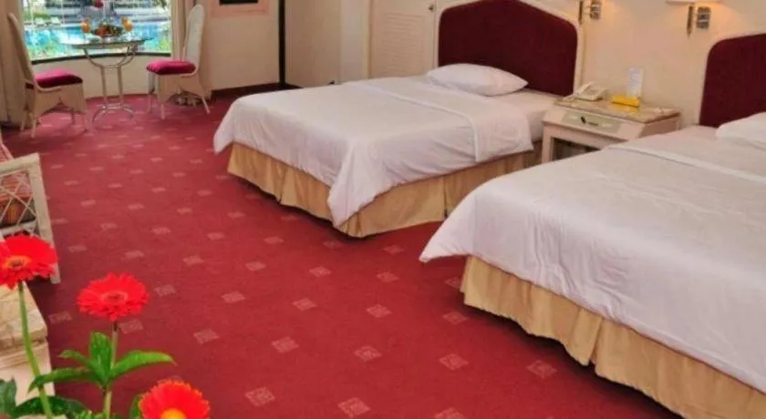 Bed in Grand Mutiara Hotel