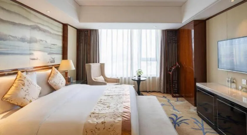 Bed in Yang Peng Jin Jiang Hotel