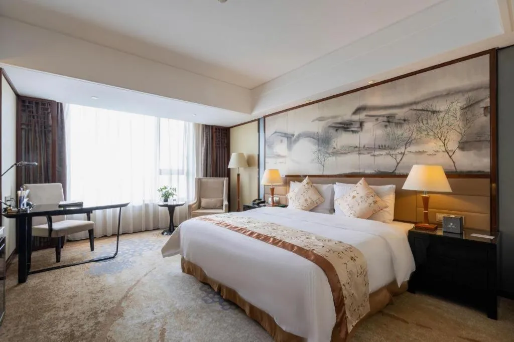 Bed in Yang Peng Jin Jiang Hotel