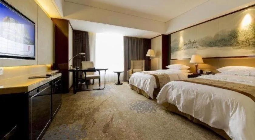 Bed in Yang Peng Jin Jiang Hotel