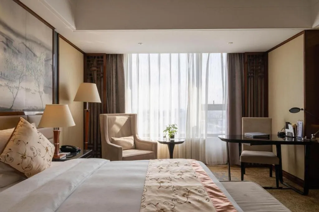 Bed in Yang Peng Jin Jiang Hotel