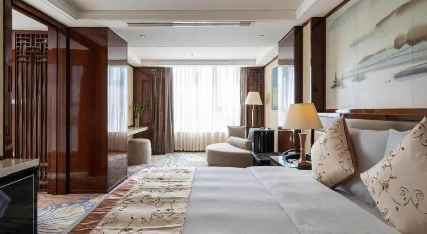 Bed in Yang Peng Jin Jiang Hotel