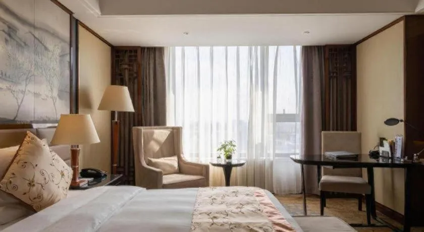 Bed in Yang Peng Jin Jiang Hotel