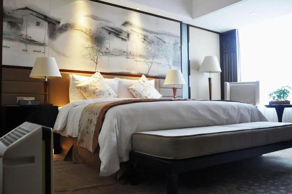 Bed in Yang Peng Jin Jiang Hotel