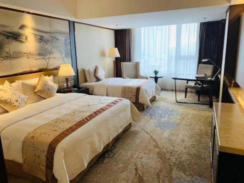 Bed in Yang Peng Jin Jiang Hotel