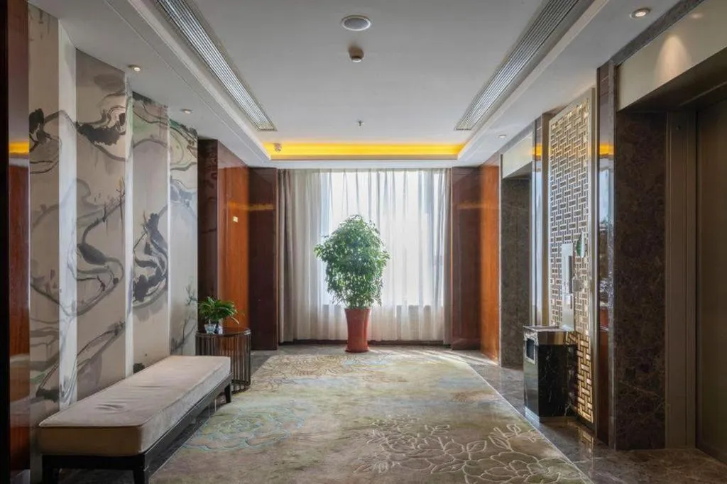 Bed in Yang Peng Jin Jiang Hotel