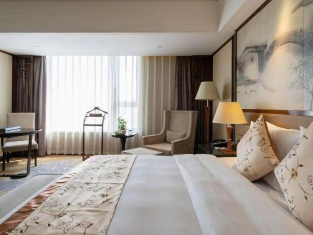 Bed in Yang Peng Jin Jiang Hotel