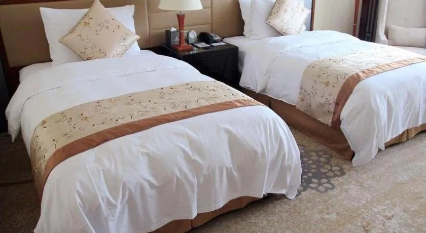 Bed in Yang Peng Jin Jiang Hotel