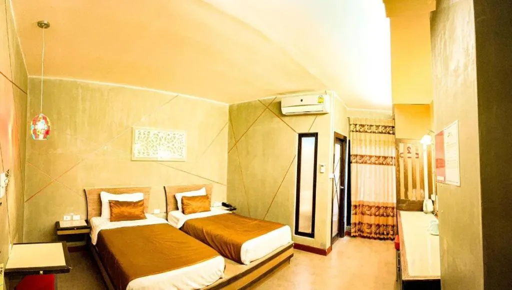 Bed in Loft Living Hotel Khonkaen