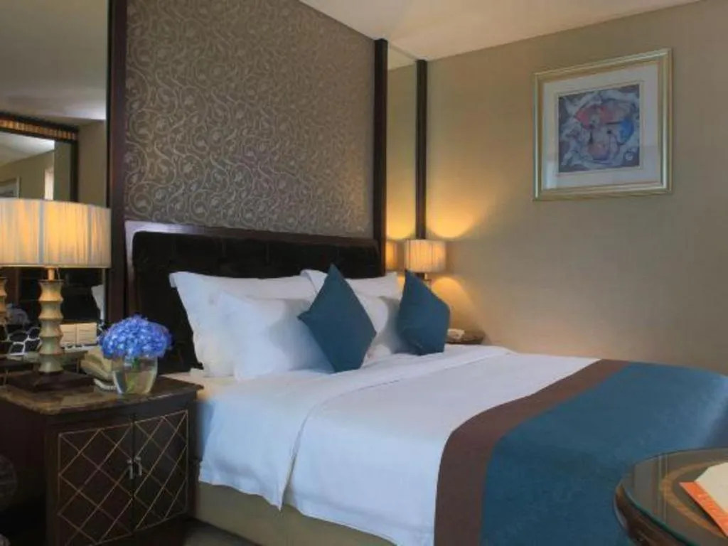 Bed in Dongguan Silver World Garden Hotel