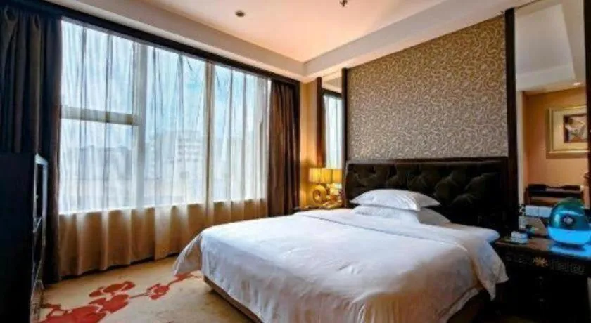 Bed in Dongguan Silver World Garden Hotel
