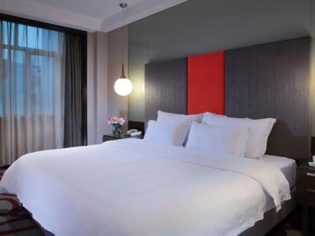 Bed in Dongguan Silver World Garden Hotel
