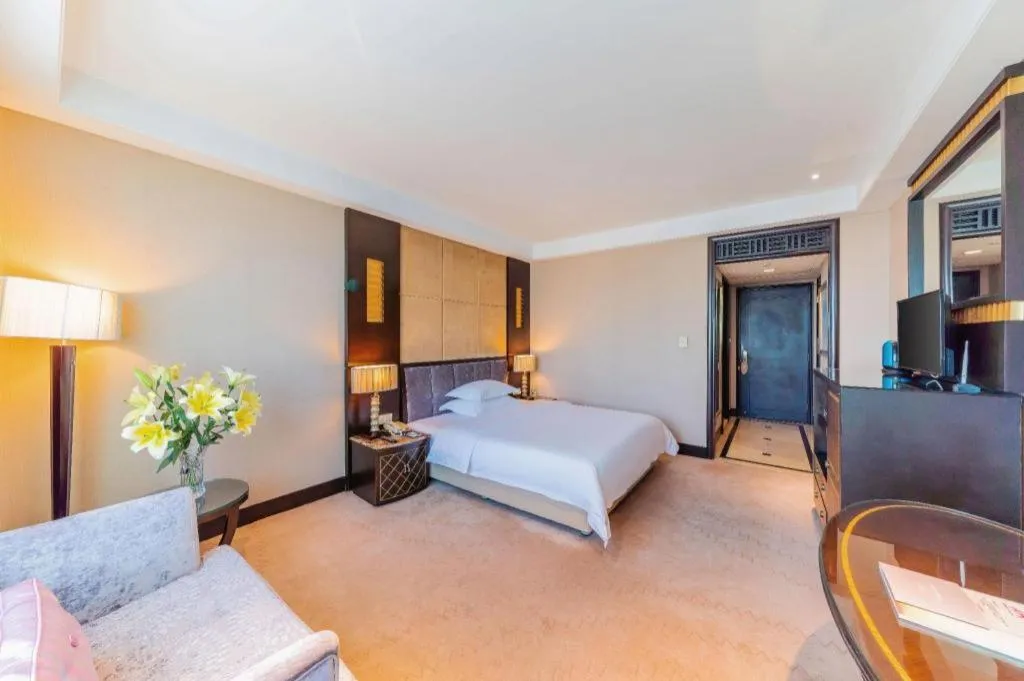 Bed in Dongguan Silver World Garden Hotel