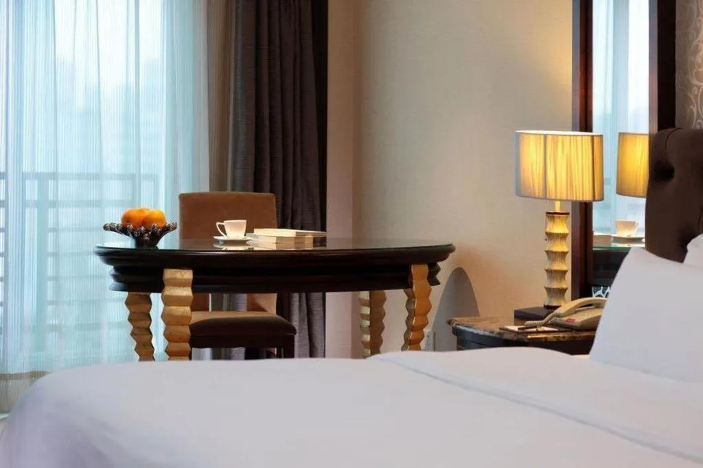 Bed in Dongguan Silver World Garden Hotel