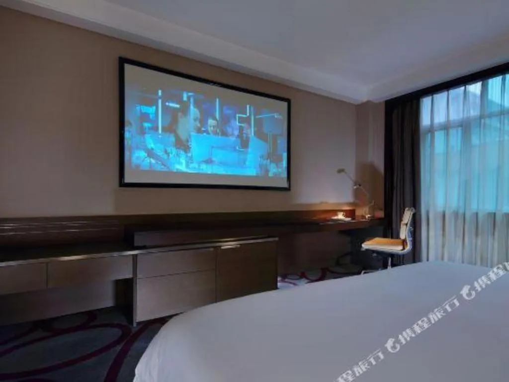 Bed in Dongguan Silver World Garden Hotel