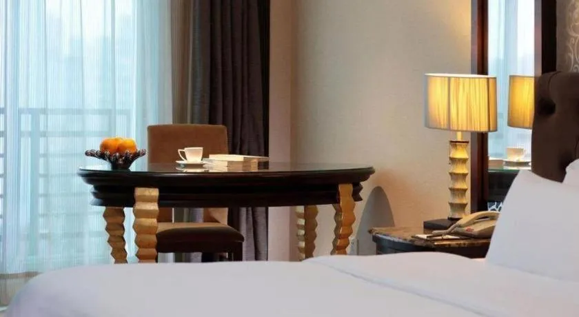 Bed in Dongguan Silver World Garden Hotel