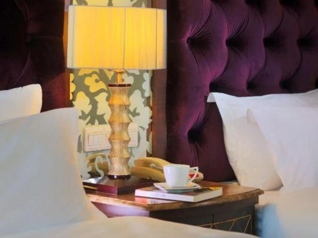 Bed in Dongguan Silver World Garden Hotel