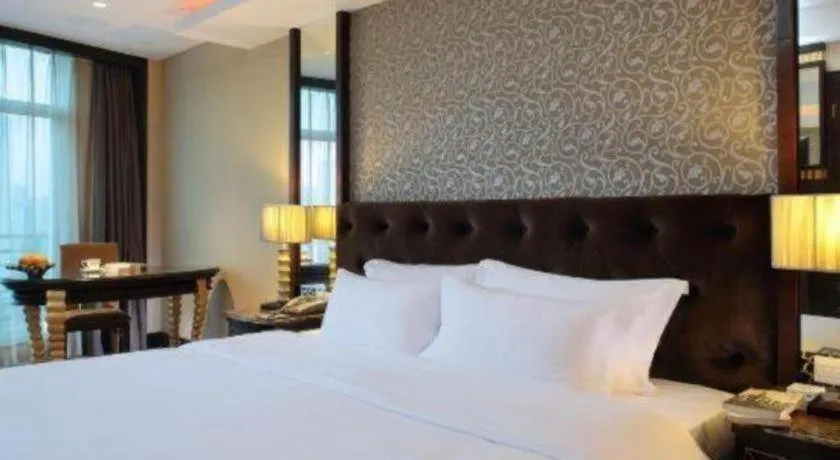 Bed in Dongguan Silver World Garden Hotel