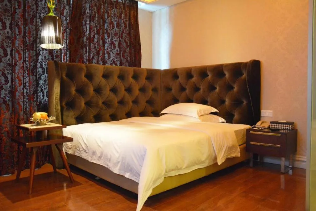 Bed in Dongguan Silver World Garden Hotel