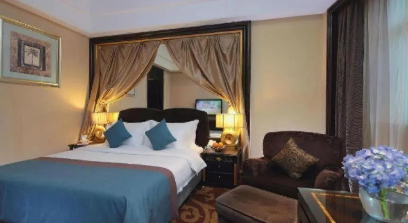 Bed in Dongguan Silver World Garden Hotel