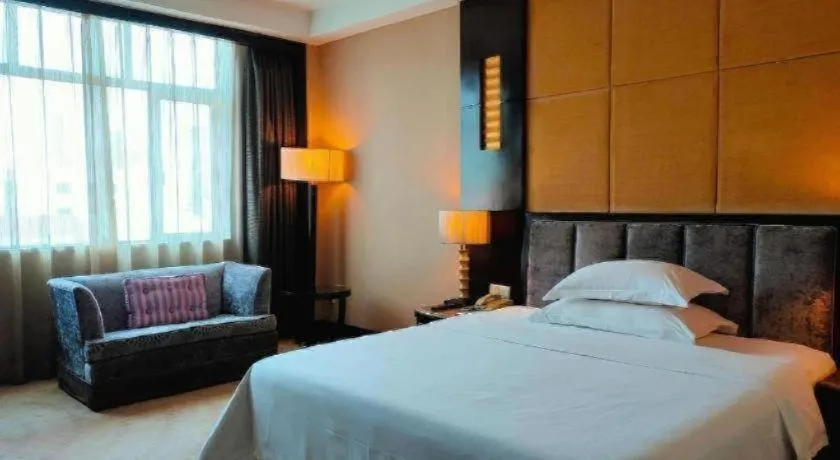 Bed in Dongguan Silver World Garden Hotel