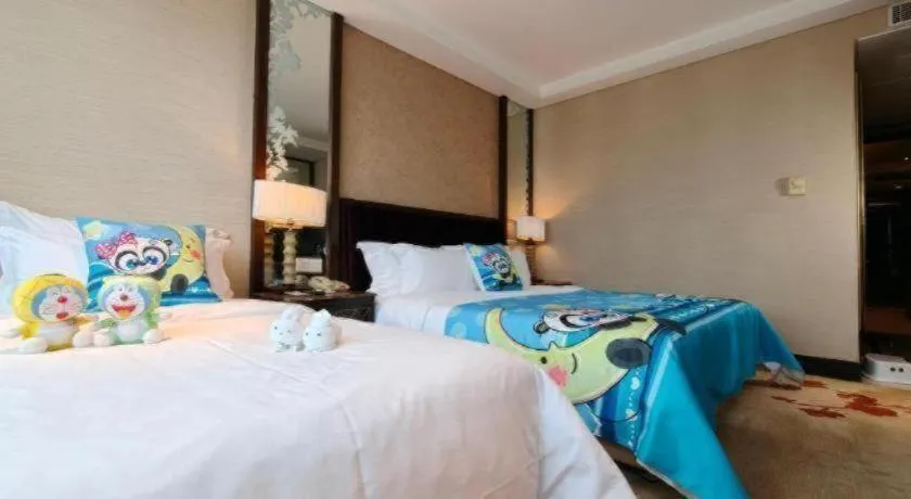 Bed in Dongguan Silver World Garden Hotel