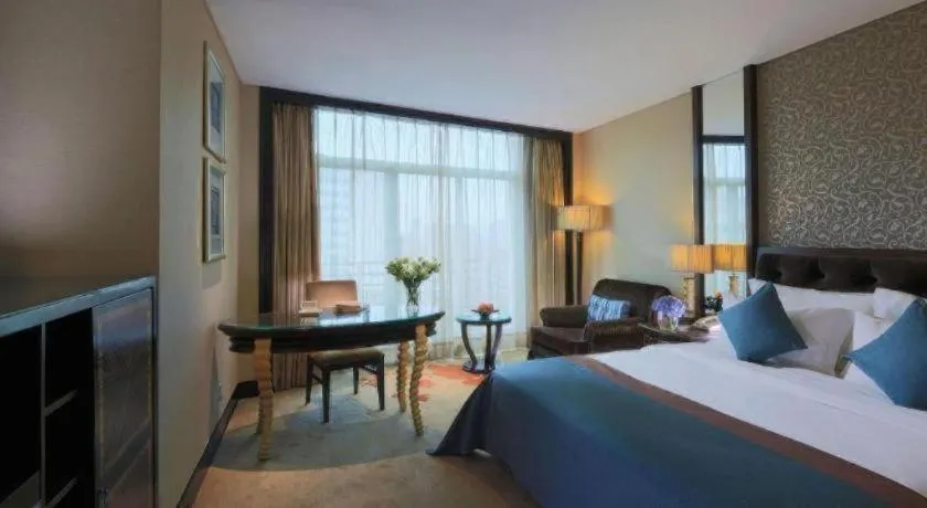 Bed in Dongguan Silver World Garden Hotel